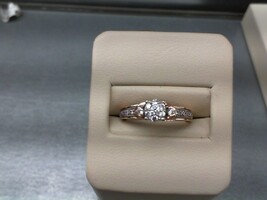  Lady's Gold-Diamond Anniversary Ring: 